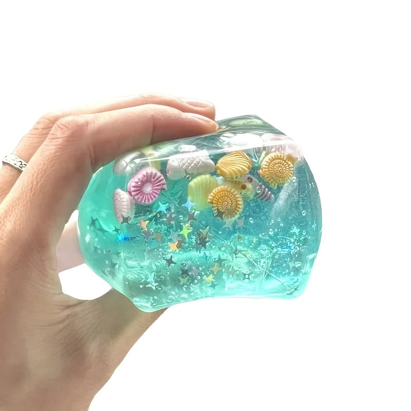 Blue ocean crystal squishy cube with shell sequins, soft jelly sensory fidget toy