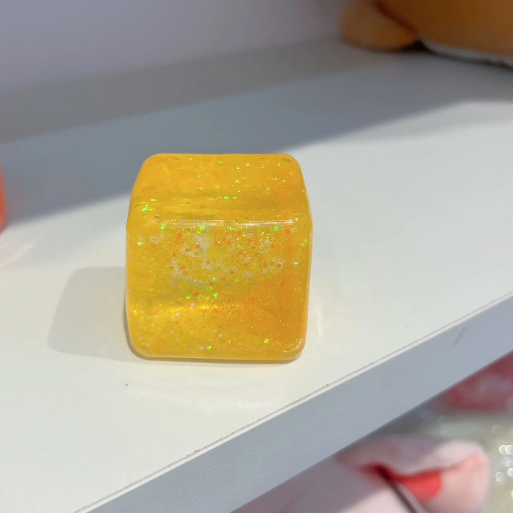Square ice cube shaped squishy fidget toy for stress and anxiety relief, sensory toy