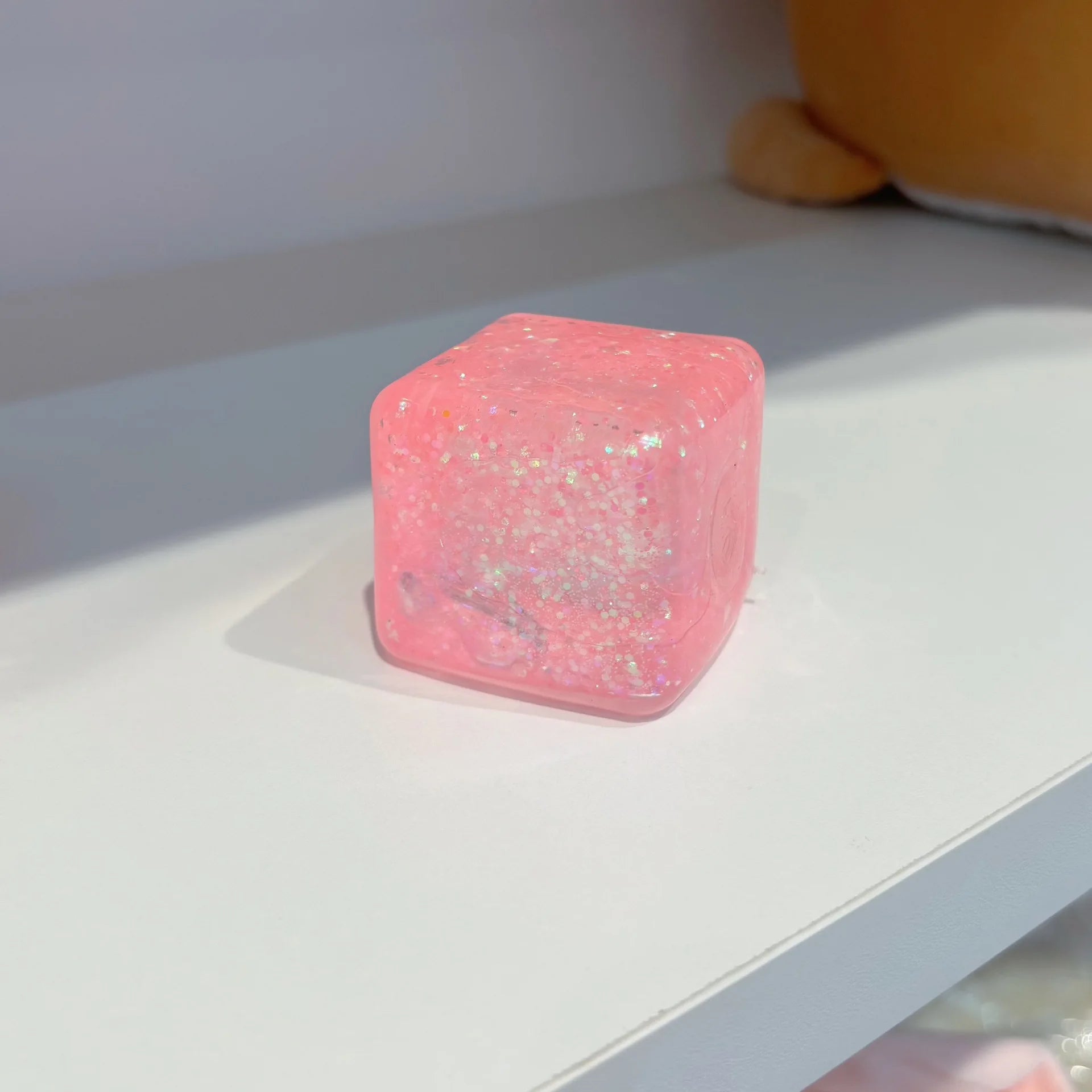 Square ice cube shaped squishy fidget toy for stress and anxiety relief, sensory toy