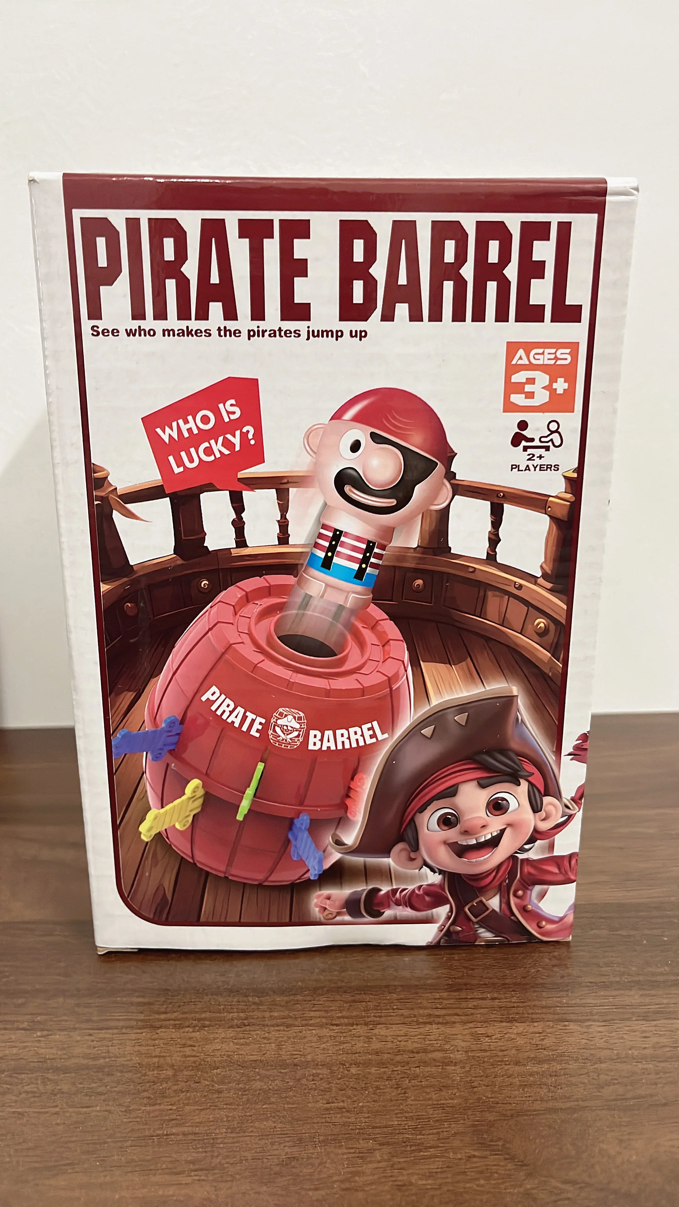 Pirate bucket prank game with swords and snapping shark, finger-biting party toy for kids