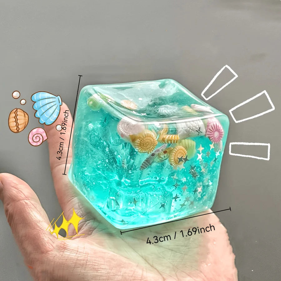 Squishy sea breeze ice cube fidget toy with mini shells and starfish, sensory stress relief