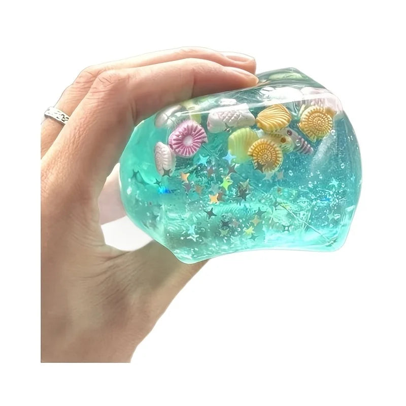 Squishy sea breeze ice cube fidget toy with mini shells and starfish, sensory stress relief