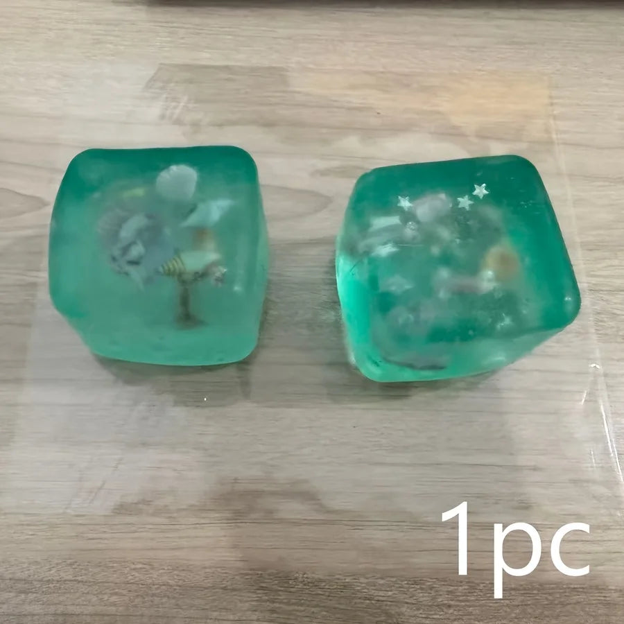 Squishy sea breeze ice cube fidget toy with mini shells and starfish, sensory stress relief